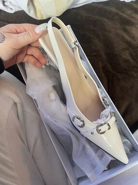 White Patent Pointed Toe Slingback Heels with Silver Buckle